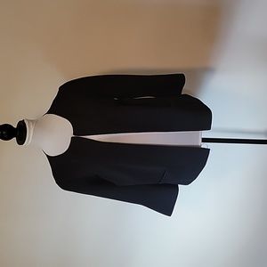 Ann Taylor black Polyester jacket with reoutdoor neck line.